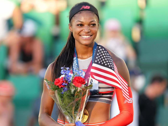 Gabby Tnomas aka Gabrielle Thomas poses with gold medal after winning the women's 200m in a meet-record 21.61 during the US Olympic Team Trials at Hayward Field.
